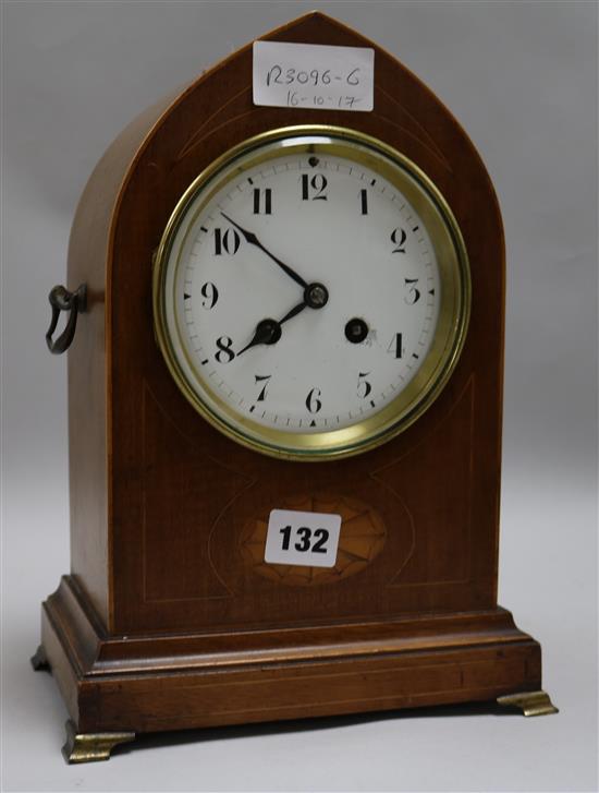 An Edwardian inlaid mahogany lancet top eight day mantel clock